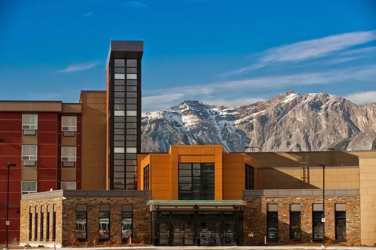 Mountain resort façade against foothills